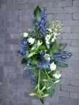 Rouwbloemstuk paars-wit