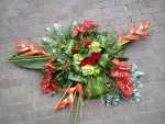 rouwbloemstuk met heliconia's